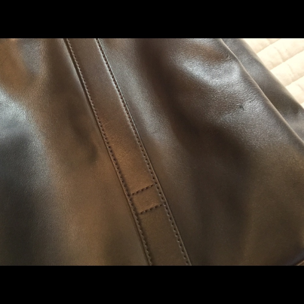 Aritzia’s Six Eleven black leather McDuffle - Picture 8 of 14